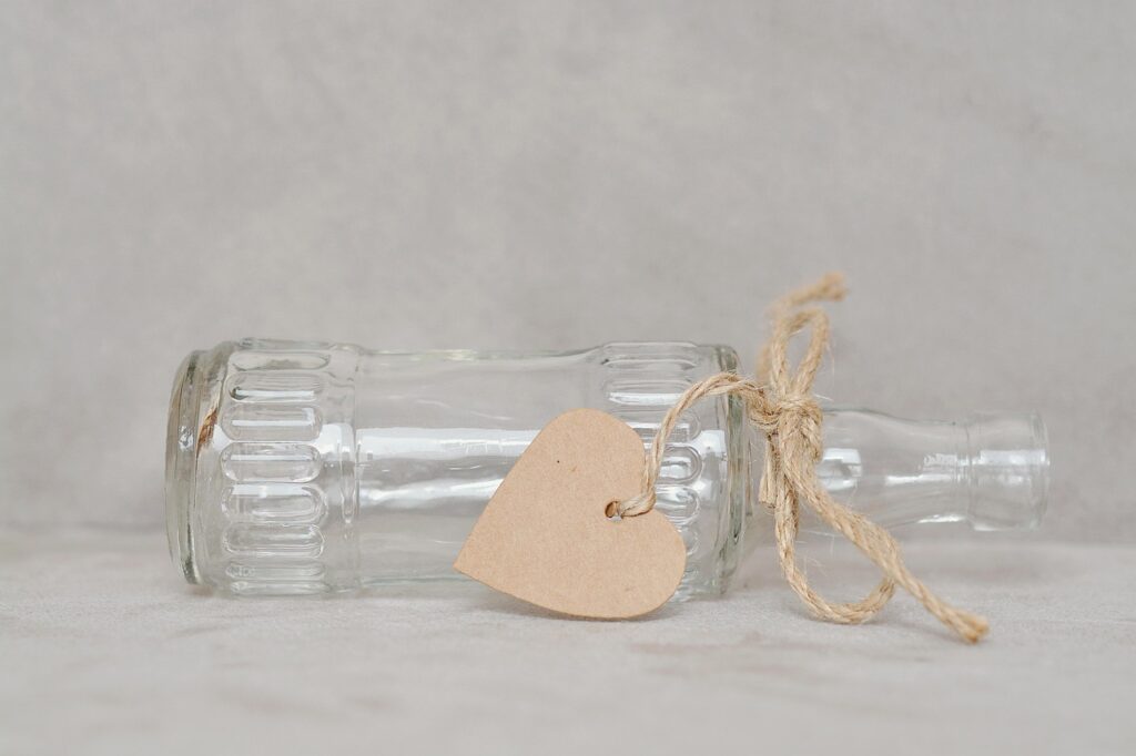 bottle, empty, empty bottle, vase, empty vase, follower, heart pendant, heart, transparent, close up, bottle, bottle, bottle, bottle, bottle